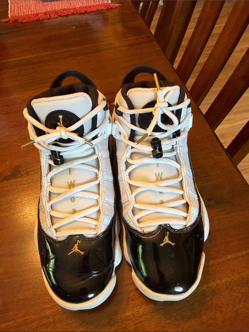 Nike Jordan 6 rings White and Black High-Top Sneakers with Gold Accents size 8
